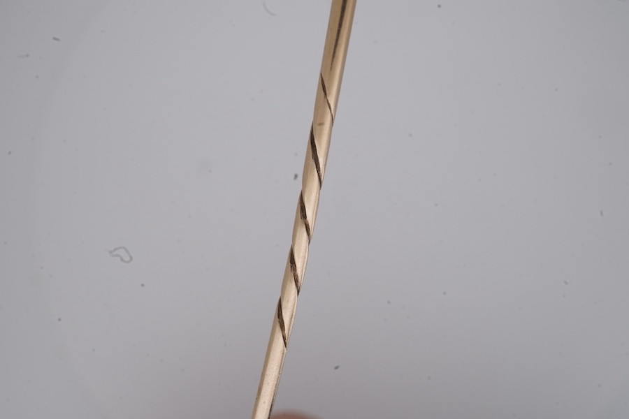 A Victorian gold and diamond stick pin, late 19th century, of circular outline with rope twist and grainti decoration, centring on a rose-cut diamond, length 7cm, gross weight 3 grams